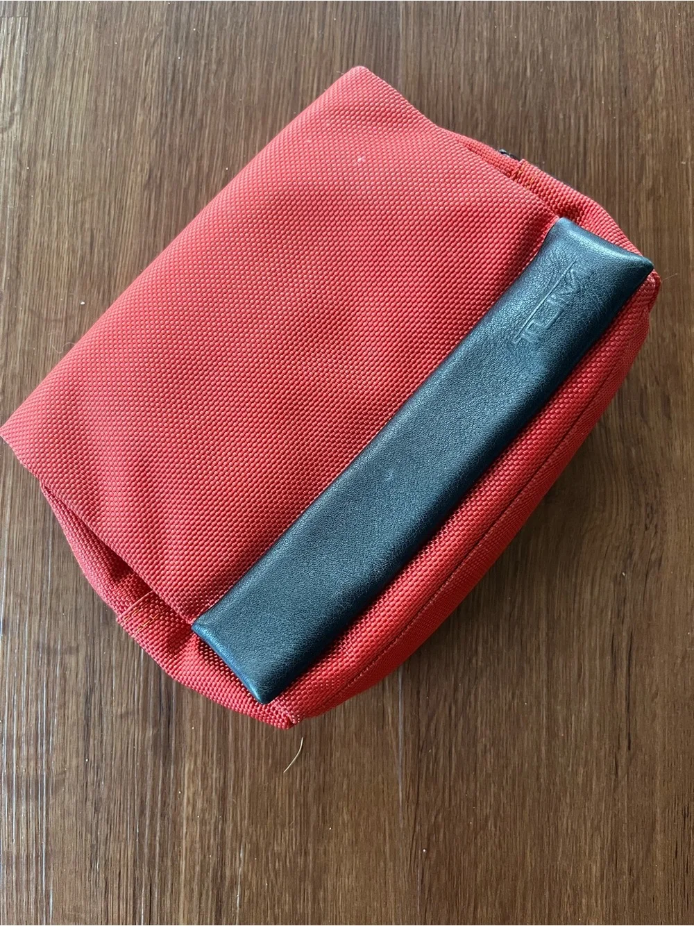 Tumi Red Travel Makeup Pouch with Black Handle